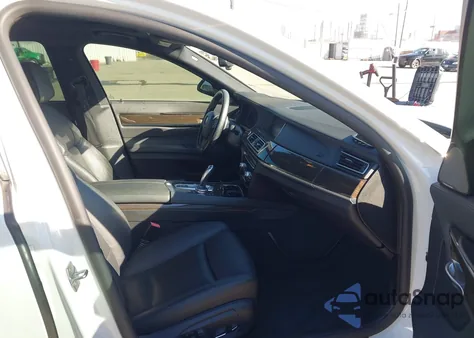 2015 BMW 740I из США, поврежденный, VIN WBAYA6C59FGK16663